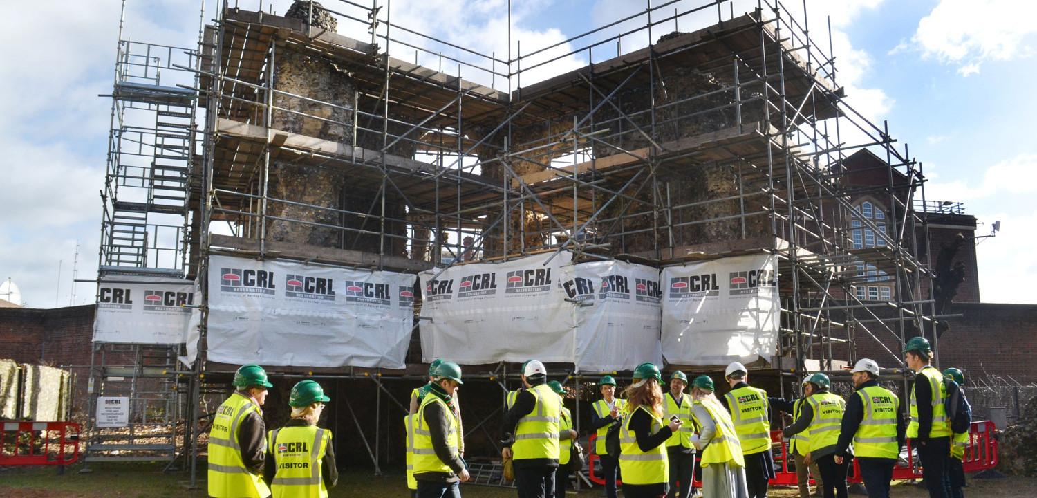 Visitors have a conservation tour of the Reading Abbey Ruins.